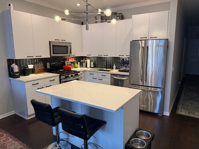 Building Photo - 2117 W Rice St Unit 3E