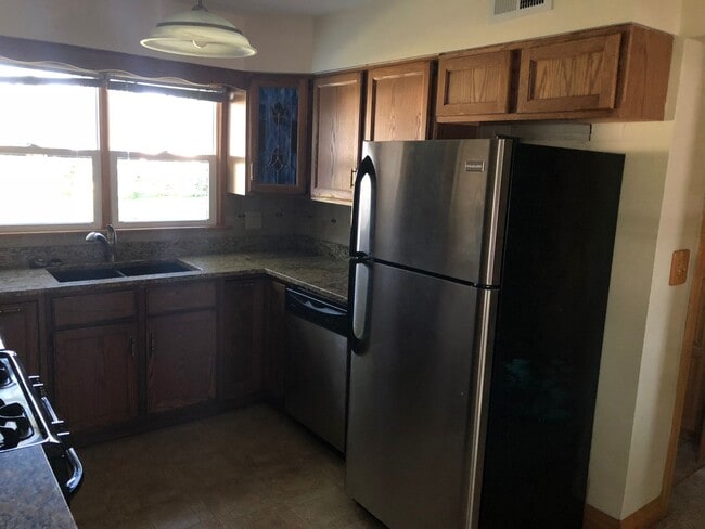 Photo - Affordable Colona Home With 2-Car Garage and Spacious Yard!