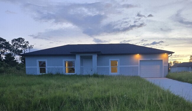 Building Photo - Brand New 3/2/1- South Lehigh Acres- Rental