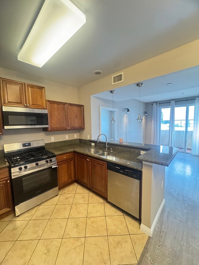 Photo - 13951 Sherman Way Unit 309