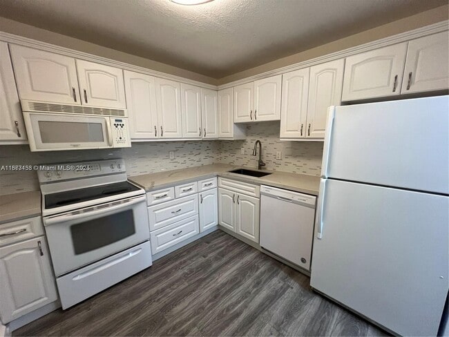 Building Photo - 7840 Camino Real Unit 306 Rental