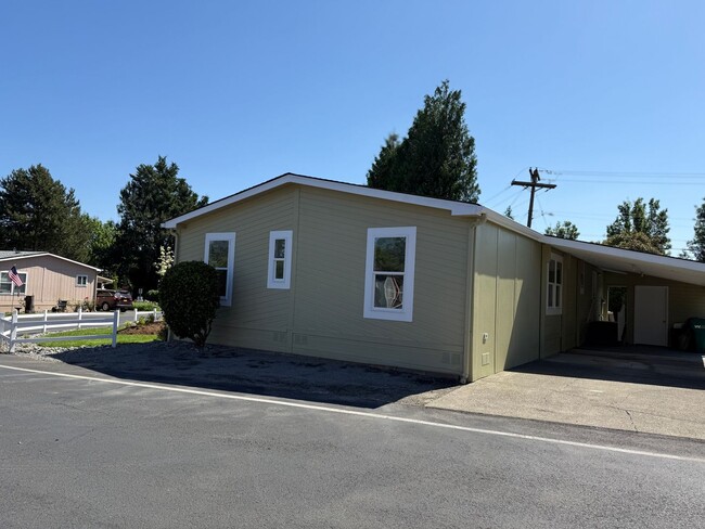Photo - Welcome to Buxton Place – A Hidden Gem in Troutdale Offering Comfortable Homes, a Strong Sense of...