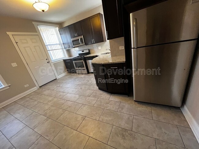 Photo - 6031 S Eberhart Ave Unit 2