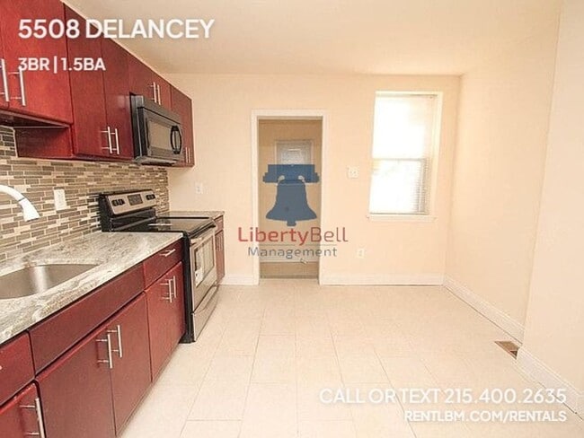 Photo - 5508 Delancey St