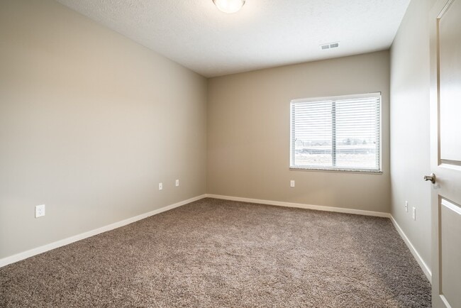 Our spacious bedrooms are filled with natural light.