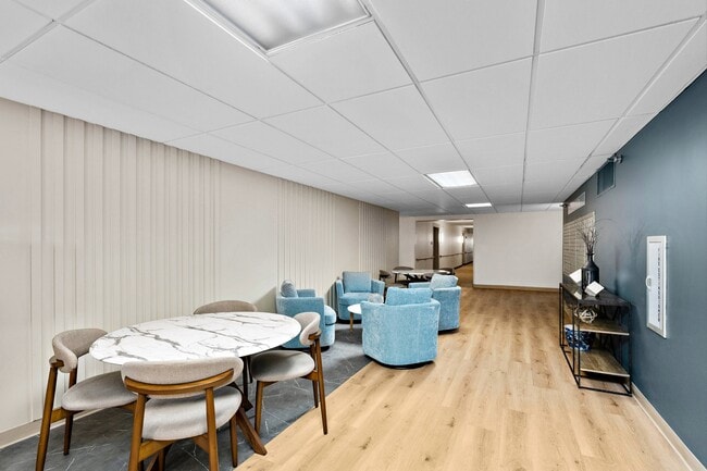 Step into sophistication at Chardon Court Apartments, where modern design meets cozy comfort. Enjoy stylish common areas, perfect for relaxation and socializing. Elevate your lifestyle today—schedule a tour to see your future home! - Chardon Court Apartments 55+