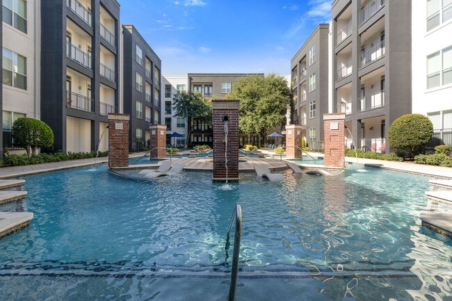 Expansive swimming pool with poolside loungers