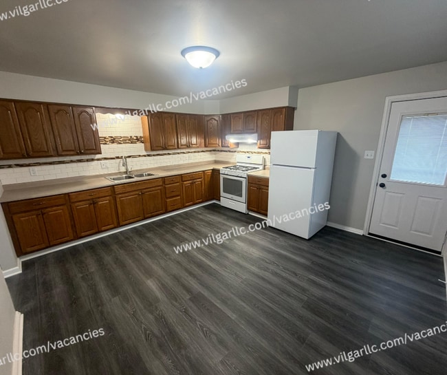 Building Photo - 5583 Tulip Ave Unit Upper ( 5585)