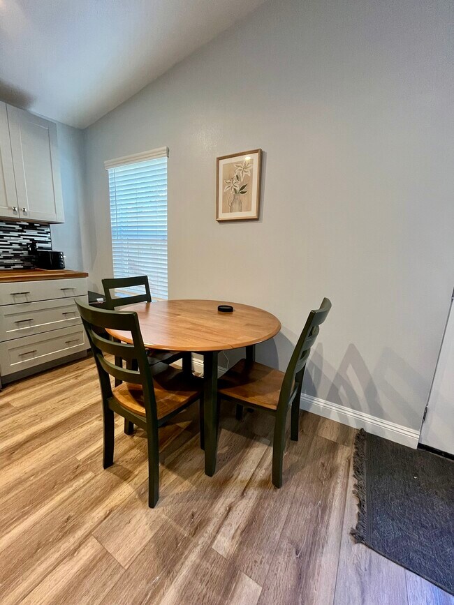 Kitchen with Table and Chairs - 3640 Catalina Dr