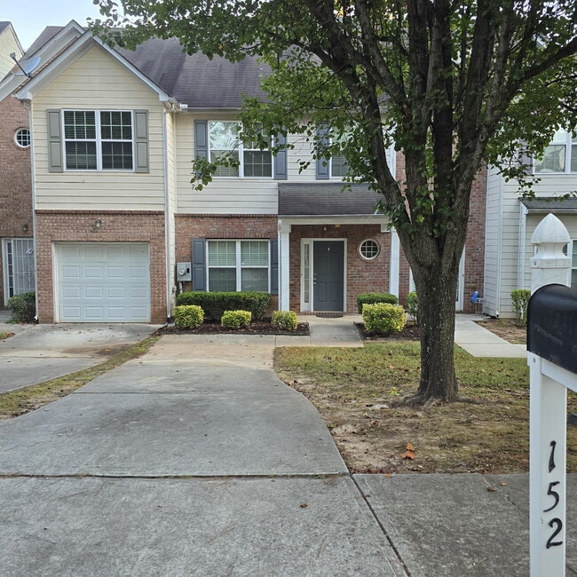 Building Photo - "Charming 3-Bed Townhouse with Hardwood El...