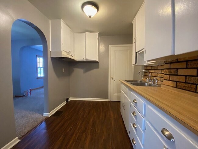 Photo - Welcome to this charming 3-bedroom, 1.5-bathroom double in the heart of Springfield, OH+