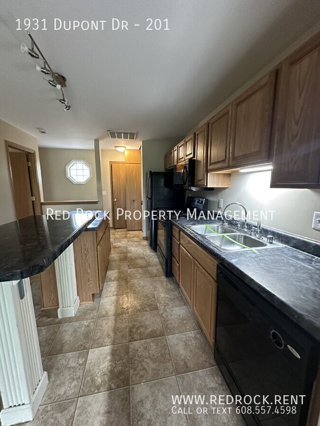 Building Photo - 1931 Dupont Dr Unit 201