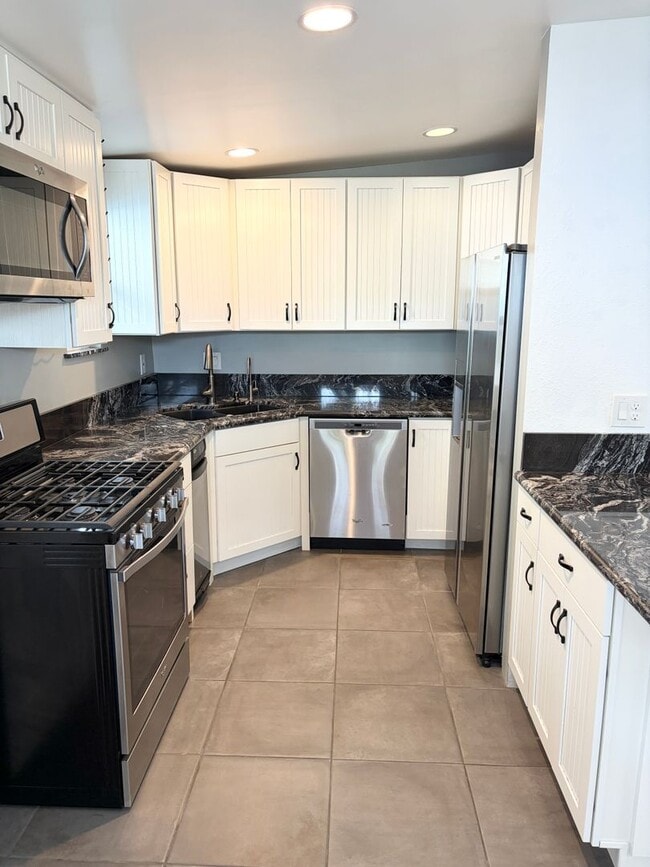 Photo - Beautifully Maintained 4-Bedroom Home with Private Backyard