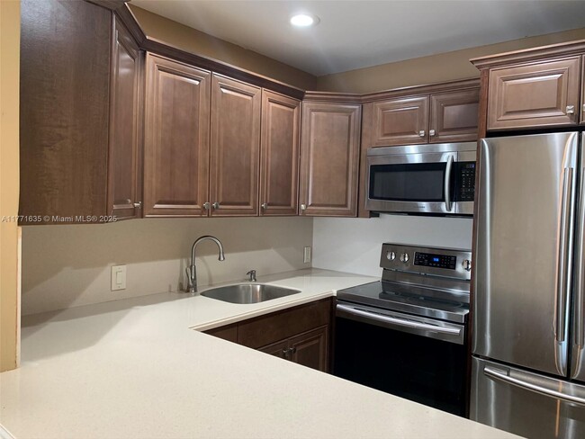 Building Photo - 4848 NW 24th Ct Unit 420 Rental