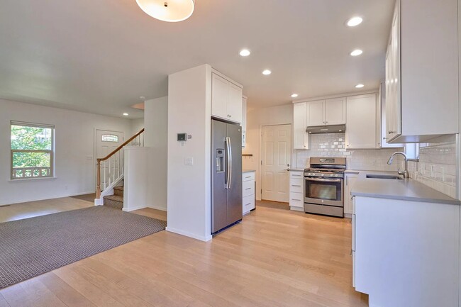 Opens to kitchen