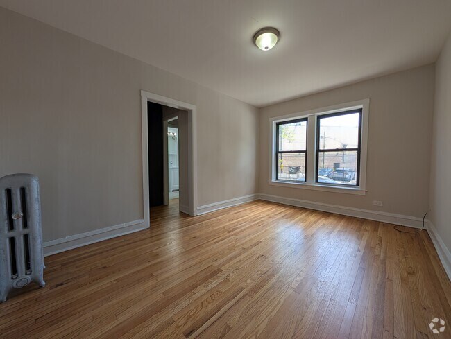 Building Photo - 2706 N Spaulding Ave Unit 2700-1EE Rental