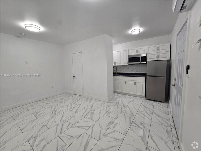 Building Photo - 1230 NW 70th St Unit 1230 Rental