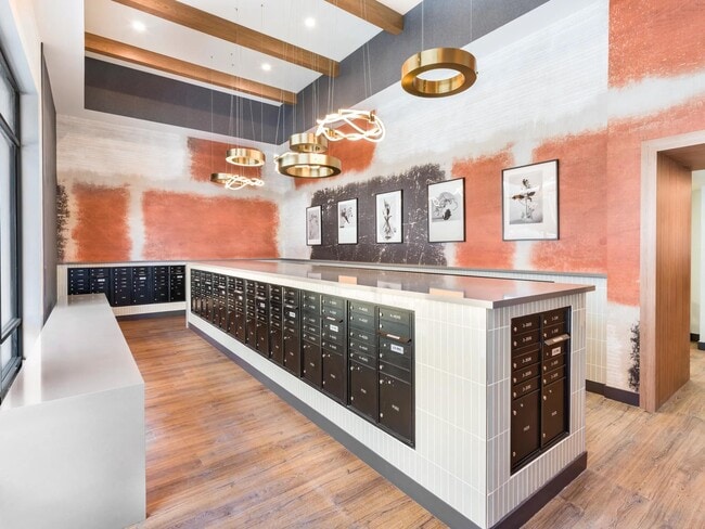 Sleek mailroom design meets modern convenience at Modera Higley Commons—your daily deliveries handled with ease just moments from home.