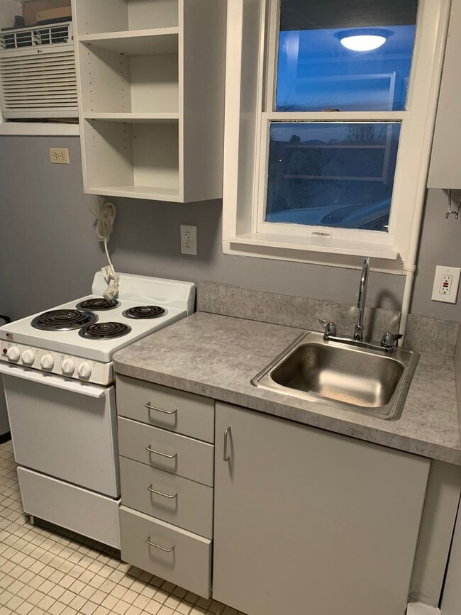 Photo - Spacious 1-Bedroom Apartment with Parking & Shared Yard — Midtown Kingston Unit 177