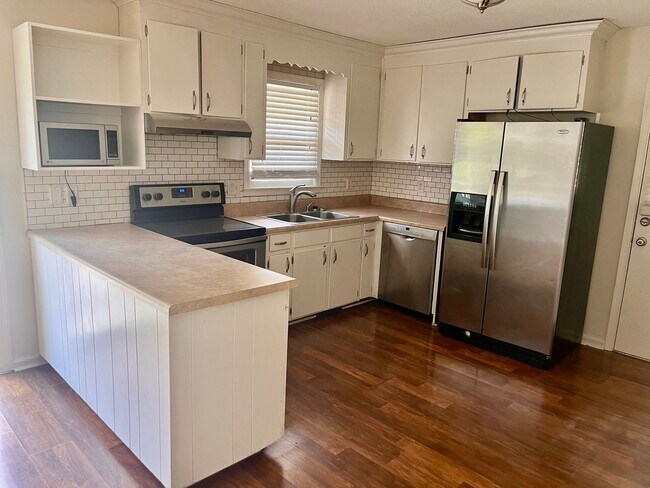 Photo - Outdoor Living Dream: Ranch-style home wit...