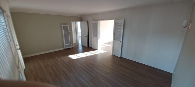 Apt #20 LR view towards DR, hallway - The Charleston