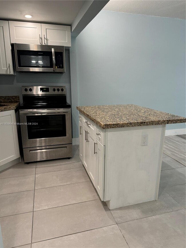 Photo - 261 S Cypress Rd Condo
