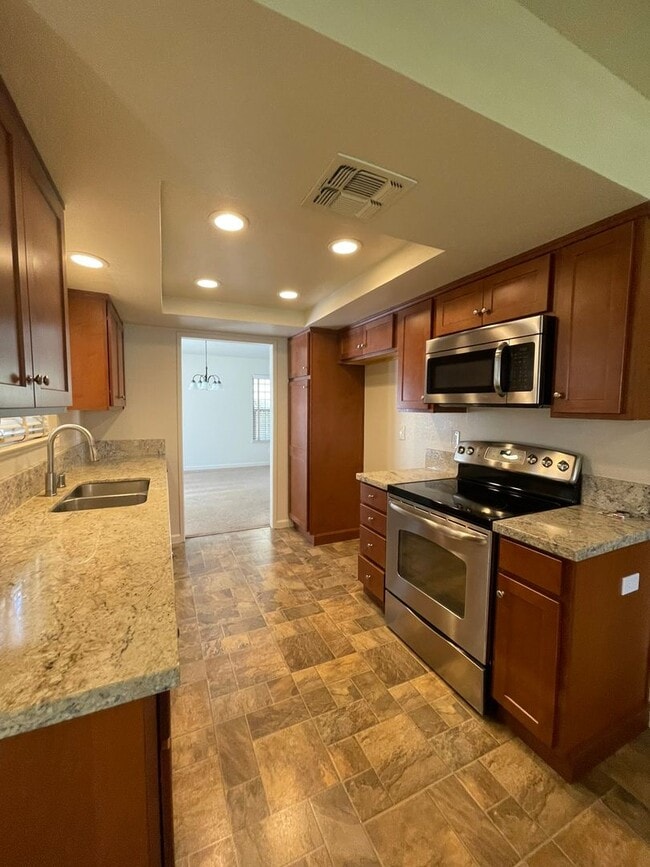 Photo - 3 Bedroom 2.5 Bath Home with Huge Covered Patio in Backyard!