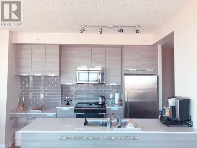 Photo - 55 Eglinton Ave W Unit 1307