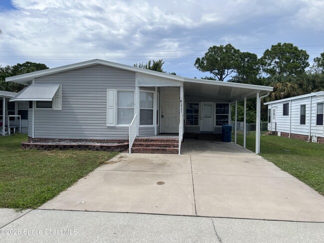 Building Photo - 2395 Coconut Palm Dr