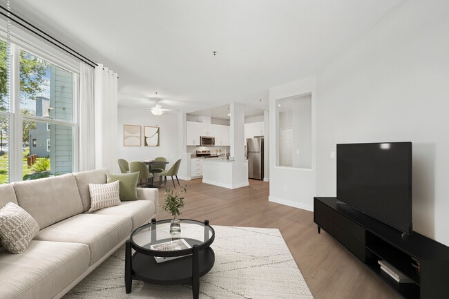 Renovated Package I living room with hard surface flooring