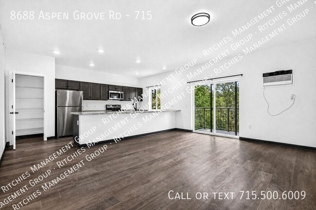 Building Photo - 8688 Aspen Ln Unit 715