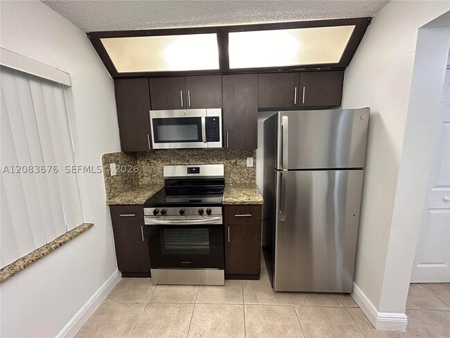 Building Photo - 3410 Foxcroft Rd Unit 101