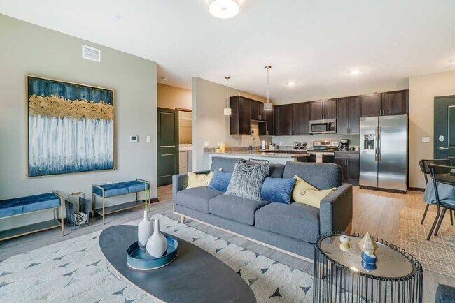 At WH Flats, live with a seamless flow between the kitchen, dining, and living areas, perfect for entertaining or relaxing at home.