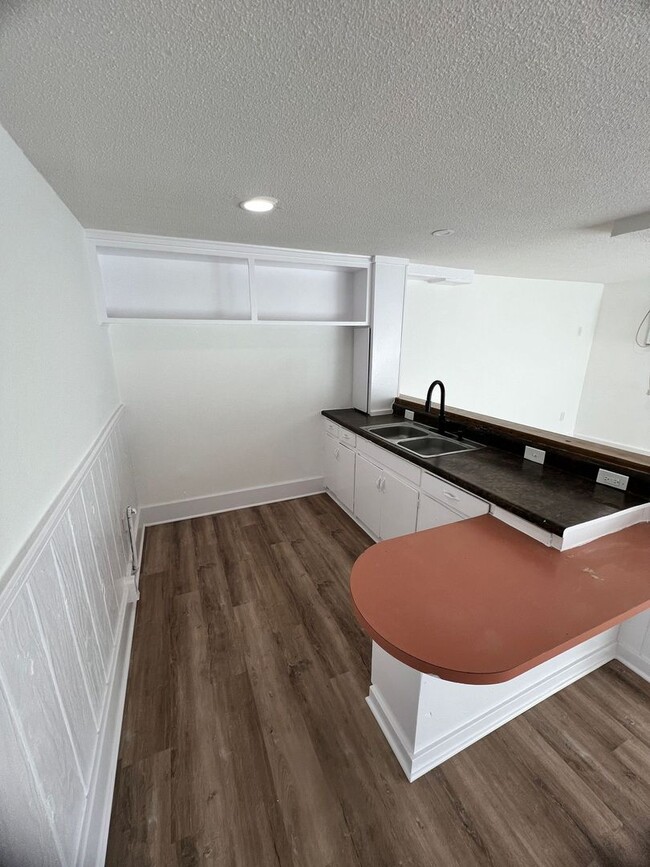 Photo - Cozy 1-Bedroom Triplex Unit with New Appliances