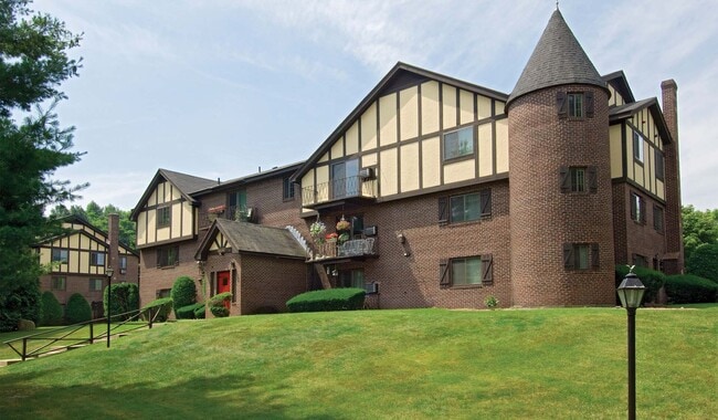 Tudor-style apartment homes - Royal Crest Warwick Apartment Homes