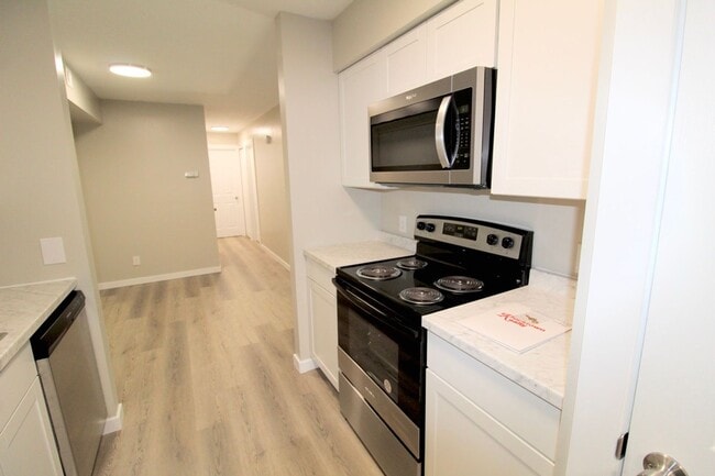 Photo - Stunning Fully Remodeled 3BR Condo at Madison Manor – Available This July!