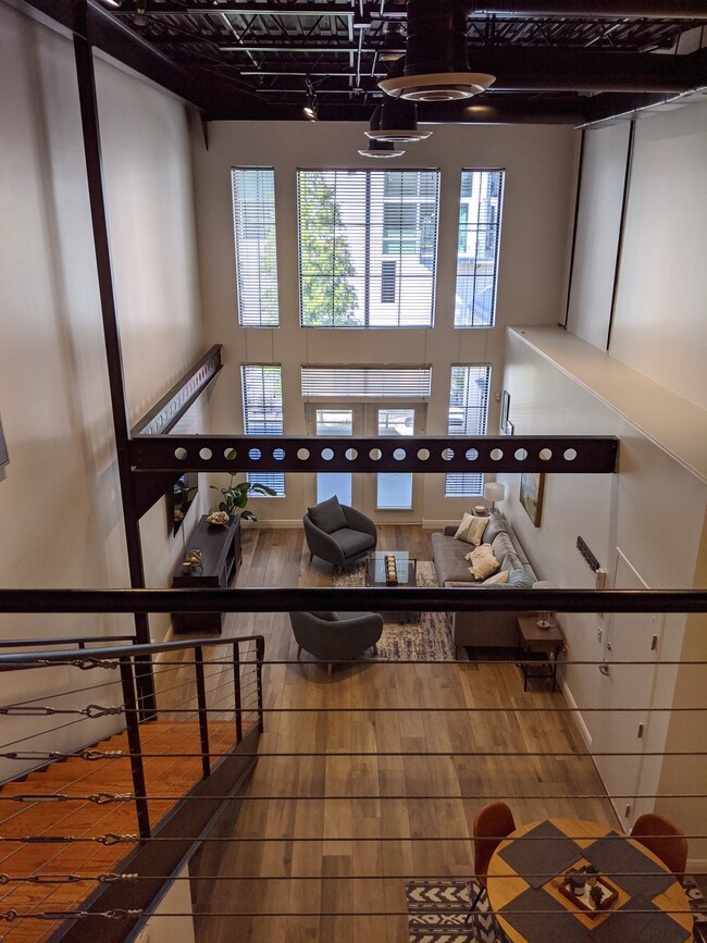 Living room from loft - 112 S 12th St Apartments Unit B