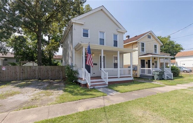 Building Photo - 1419 W 27th St Unit 1