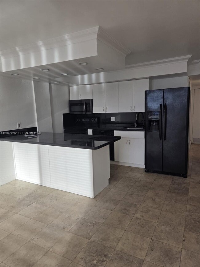 Building Photo - 7900 Tatum Waterway Dr Unit 304