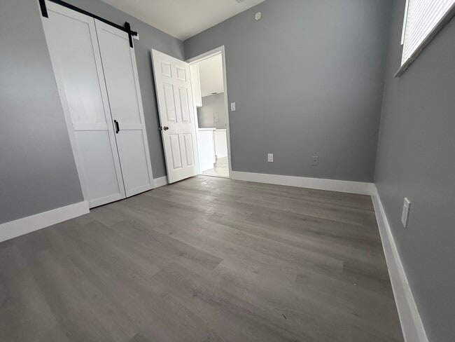 Bedroom 2 with barn door - 1404 NW 6th Ave Unit 2.0