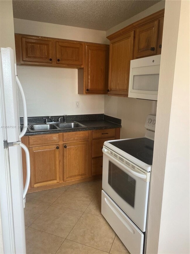 Photo - 7279 W 24th Ave Unidad 246