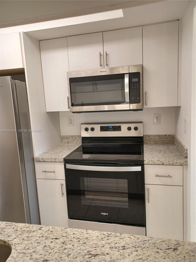 Building Photo - 8275 SW 152nd Ave Unit D-416