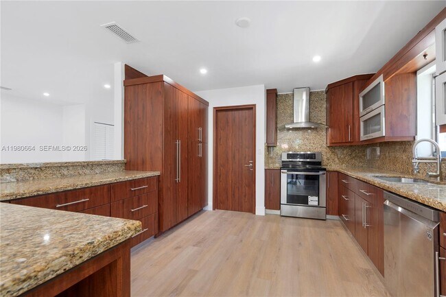 Photo - 8951 Byron Ave