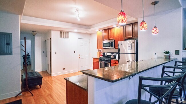 Building Photo - 6709 N Lakewood Ave Unit 2S Rental