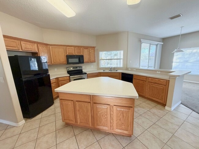 Photo - Spacious 3-bedroom, 2-bathroom home offering 2,362 square feet of living space with a desirable o...