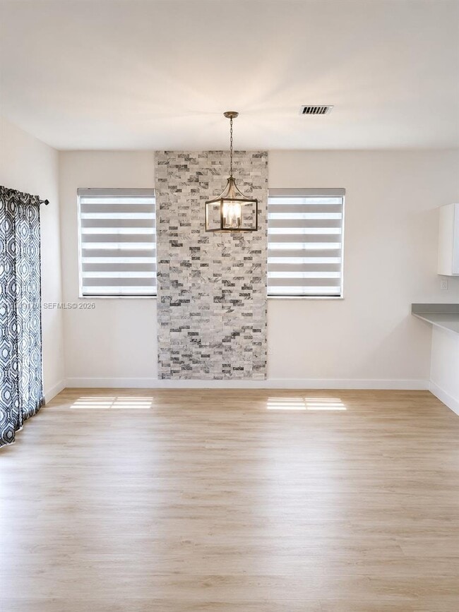Building Photo - 15560 SW 136th St Unit 201