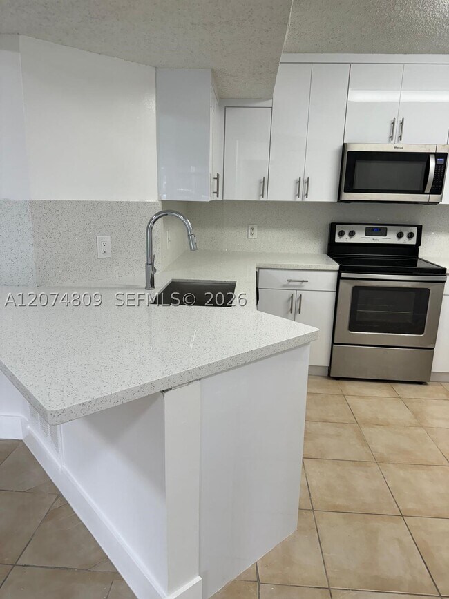 Photo - 8801 Wiles Rd Unit 103