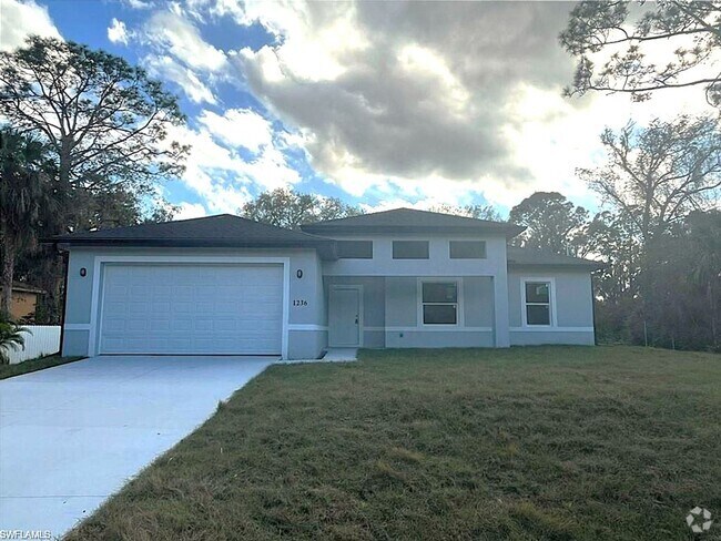 Building Photo - Large 4 bedroom, 3 bath, 2 car garage-MOVE... Rental
