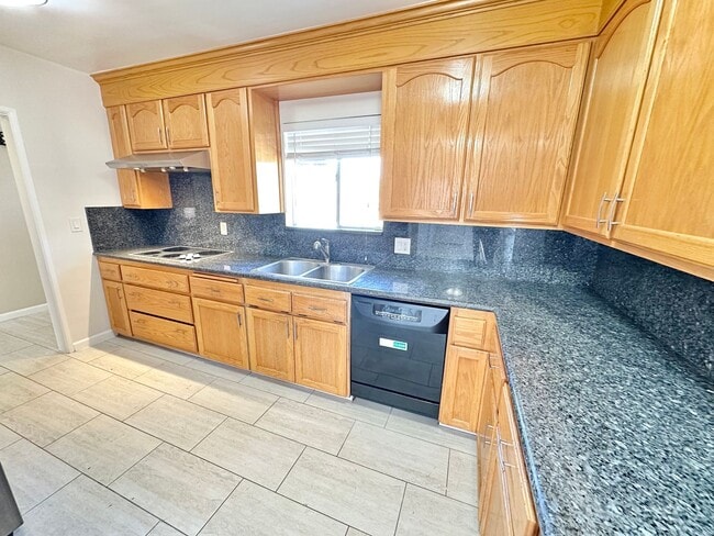 Photo - Spacious 4BD/2BA Two-Story Home with Yard, Fireplace & Parking in The Plaza