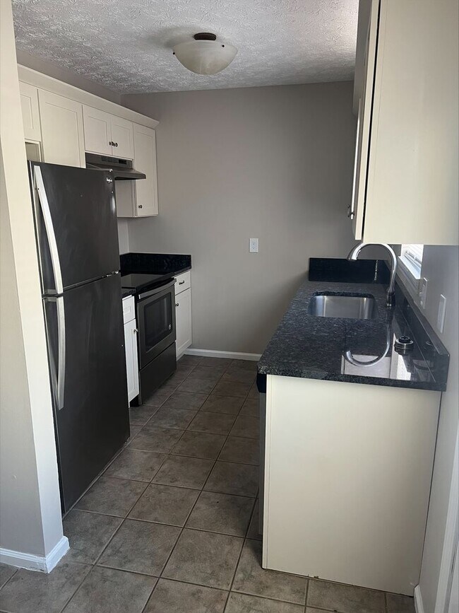 Photo - Spacious 2-Bedroom Townhouse with Garage